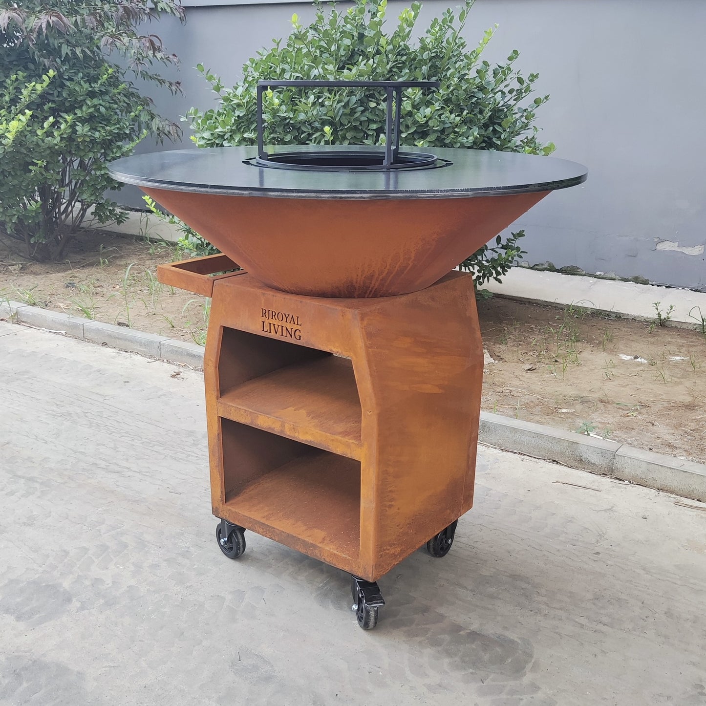 BBQ Plancha Grill Maestro XXXL Ø100cm Cortenstaal - Met Grote wielen en houtopslag