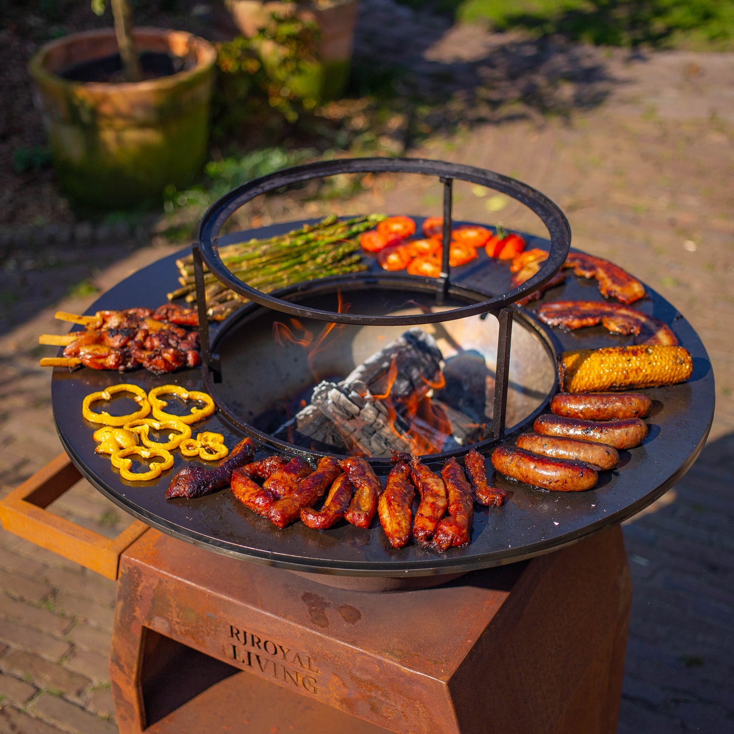 BBQ Plancha Grill Maestro Ø70cm Cortenstaal - Met Grote wielen en houtopslag